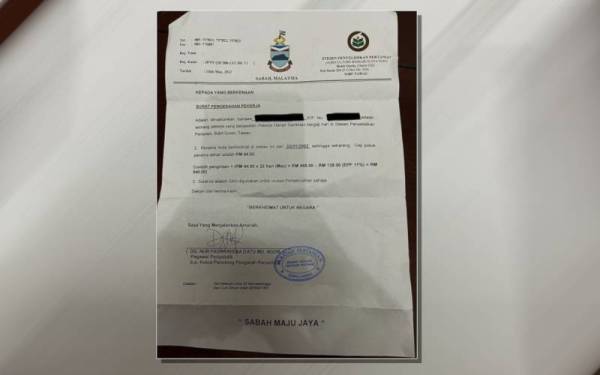 Surat yang memaparkan gaji yang diperoleh salah seorang pekerja di sebuah agensi di Tawau.