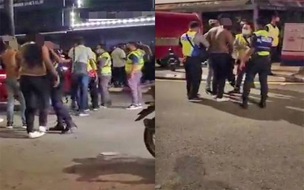 Tangkap layar rakaman video menunjukkan anggota polis meleraikan pergaduhan kumpulan lelaki berhampiran sebuah pub di Jalan Telawi 5, Bangsar, Kuala Lumpur, yang tular di media sosial sejak Ahad