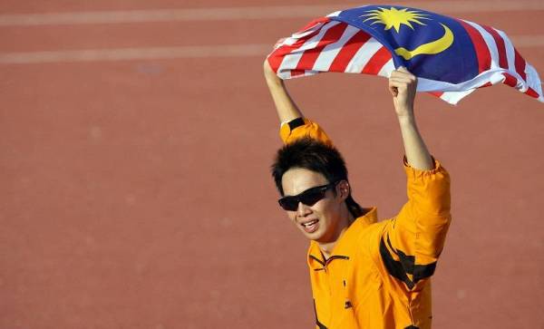 Hup Wei ketika beraksi di Sukan Asia Thailand 2007. FOTO: AFP