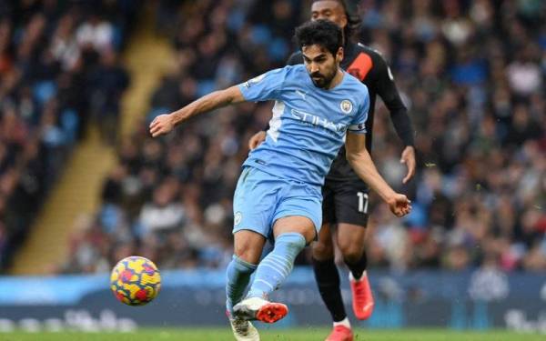 Gundogan menyifatkan pertemuan menentang Liverpool bakal menjadi penentu kejuaraan liga musim ini. - Foto AFP