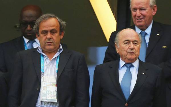 Platini (kiri) dan Blatter akan dibicarakan pada Jun ini, atas pertuduhan rasuah berhubung pembayaran AS$2 juta (RM8.4 juta) yang dibuat FIFA kepada Platini.