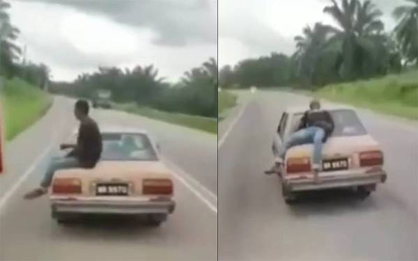 Video tular seorang lelaki duduk dan baring atas sebuah kereta yang sedang bergerak di Kilometer 210 Jalan Johor Bahru-Seremban, Batu Anam, Segamat, baru-baru ini.