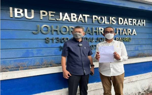 Salahuddin (kiri) dan wakil Amanah Johor, Onn Jaafar membuat laporan supaya siasatan dilakukan terhadap komplot mahu mencemarkan sistem kehakiman negara, di IPD Johor Bahru Selatan, Larkin, Johor Bahru, pada Kkamis.