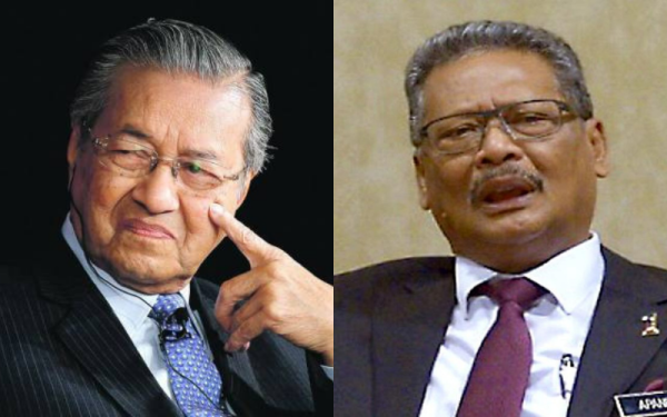 Dr Mahathir (kiri) dan Mohamed Apandi.