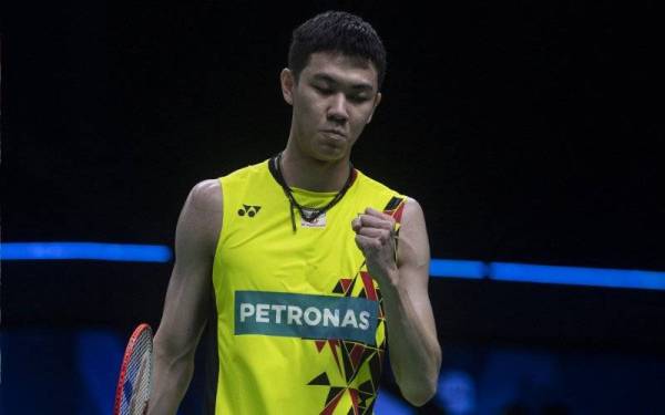 Reaksi Zii Jia ketika menentang Momota pada perlawanan kumpulan Piala Thomas di Stadium Impact Arena Bangkok. - Foto Bernama