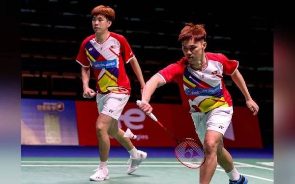 Malaysia kemudian bangkit menyamakan kedudukan apabila beregu pertama Man Wei Chong-Tee Kai Wun mengetepikan cabaran gandingan Do Tuan Duc-Pham Hong Nam 21-8, 20-22, 21-18. - Foto BAM 