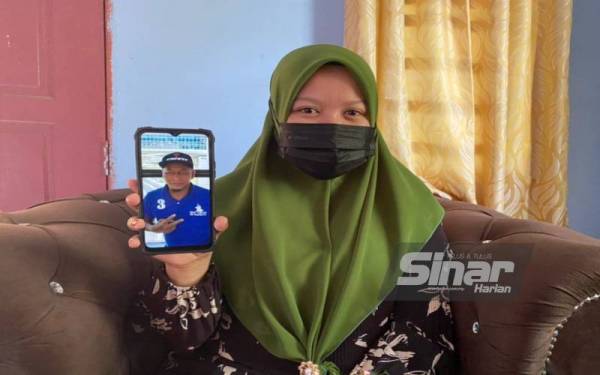 Noorizzaty Shakira menunjukkan gambar suaminya yang tidak pulang ke rumah sejak lima hari lalu.