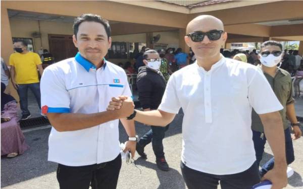 Hans (kiri) dan Altimet turut hadir menyaksikan proses pengundian cabang berkenaan pada pagi Sabtu.