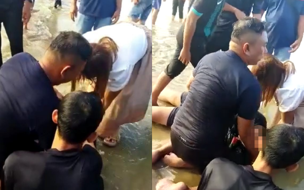 Abdul Baharin (kiri) ketika memberi bantuan CPR kepada mangsa lemas dalam kejadian di Pantai Shahbandar, Tuaran.