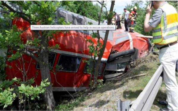 Sebuah kereta api tergelincir dari landasan, berhampiran bandar ski Alpine Garmisch-Partenkirchen di Bavaria, selatan Jerman. - Foto msn.com