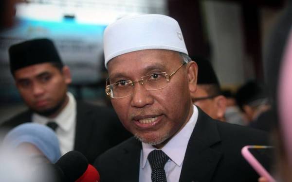 Menteri di Jabatan Perdana Menteri (Hal Ehwal Agama) Senator Datuk Idris Ahmad - Foto Bernama