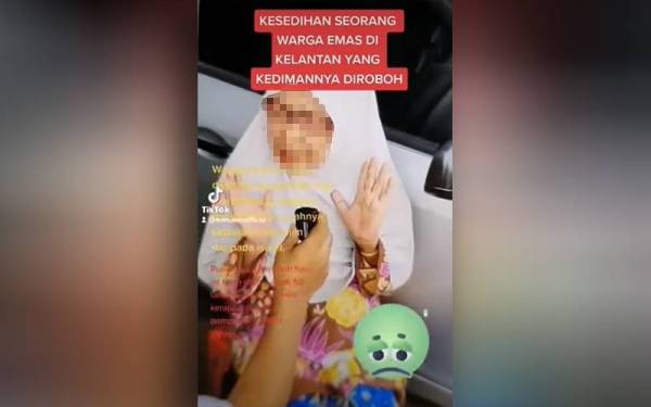 Tangkap layar video tular pada Selasa mengenai seorang wanita mendakwa dirinya dizalami selepas rumahnya dirobohkan oleh PKNIK.