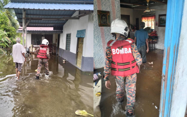 Hujan lebat berterusan dan longkang tersumbat punca lima buah rumah dinaiki air. Foto Bomba