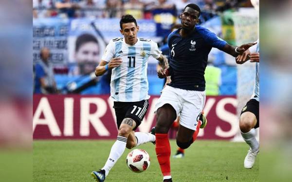 Kehadiran Pogba (kanan) dan Di Maria bakal perkuatkan jentera serangan Juventus. - Foto Andina