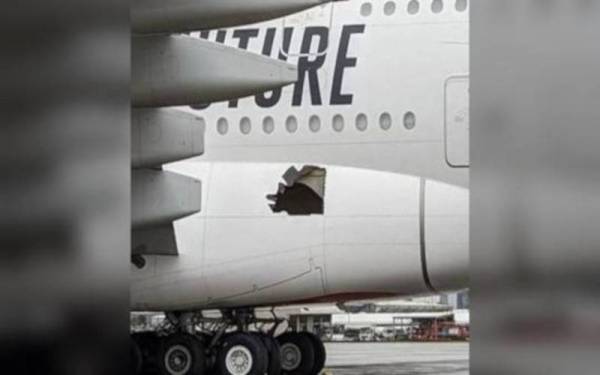 Sebuah lubang terdapat pada pesawat Airbus A380 ketika ia terbang dari Dunai ke Brisbane pada Jumaat lalu, - Foto © Twitter / JACDENNEW