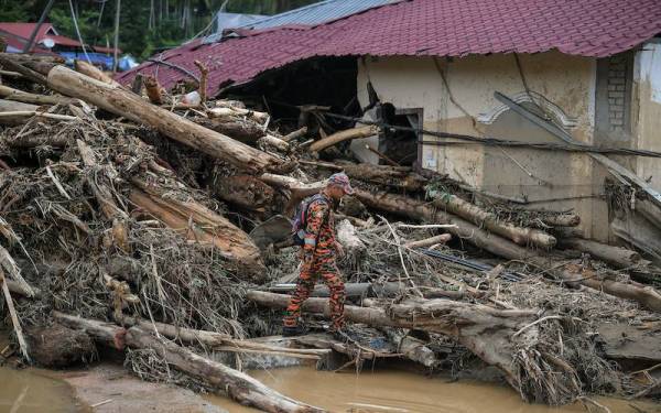 Bencana banjir menjejaskan 12 kampung di sekitar daerah Baling, Kedah. Foto Bernama.