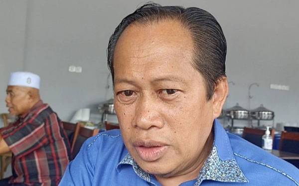 AHMAD MASLAN