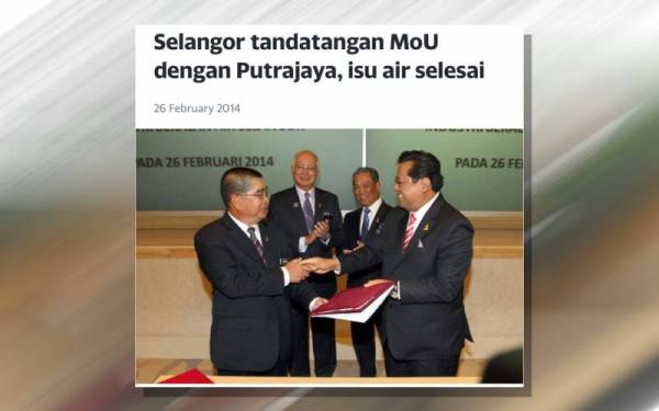 Allahyarham Abdul Khalid (kanan) ketika menandatangani MoU selesai isu air pada 2014. - Foto Facebook Najib Razak