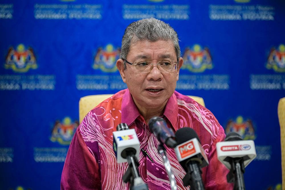 Menteri Luar Negeri Datuk Seri Saifuddin Abdullah ketika sidang media selepas Majlis sambutan Hari ASEAN Ke-55 di Markas SMART, NADMA. - Foto Bernama