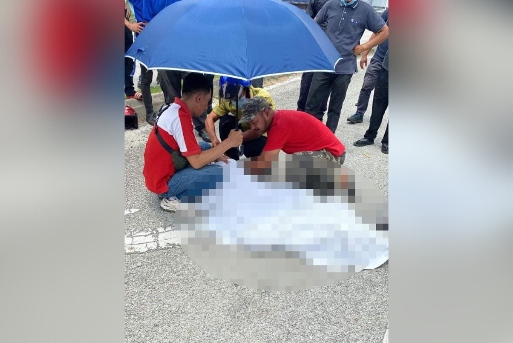 Mangsa maut di tempat kejadian dalam nahas membabitkan dua kenderaan di Proton City, Tanjung Malim pada Rabu. - Foto ihsan pembaca