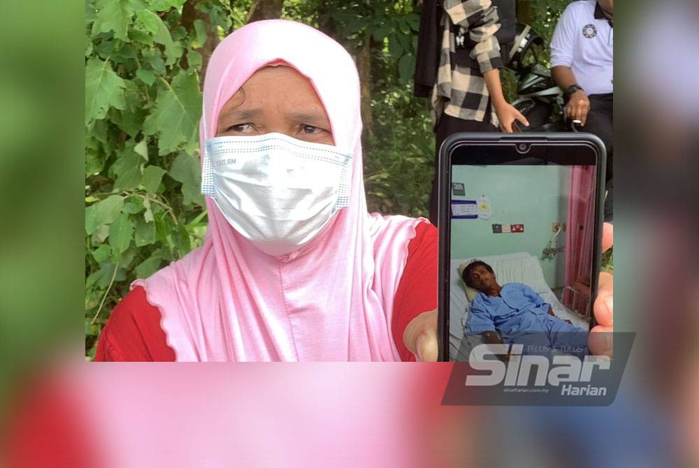 Adik mangsa, Normawati Jaafar menunjukkan keadaan mangsa ketika ditempatkan di hospital baru-baru ini.