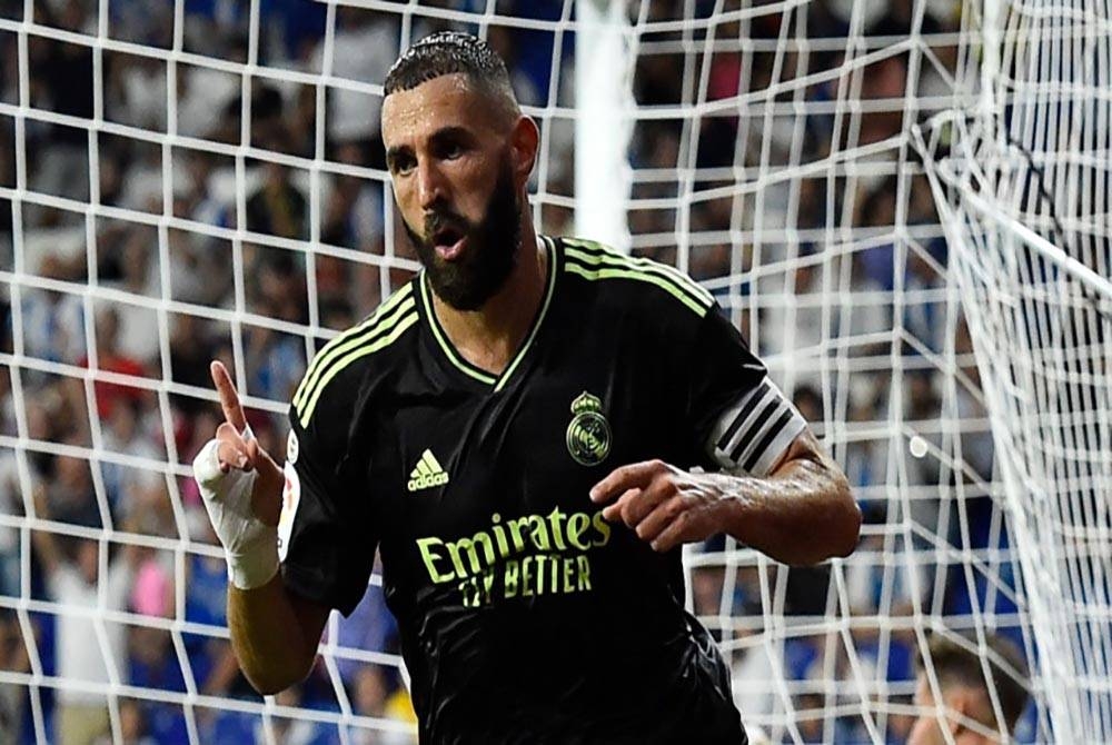 Benzema meraikan jaringannya ketika membantu Real menewaskan Espanyol.