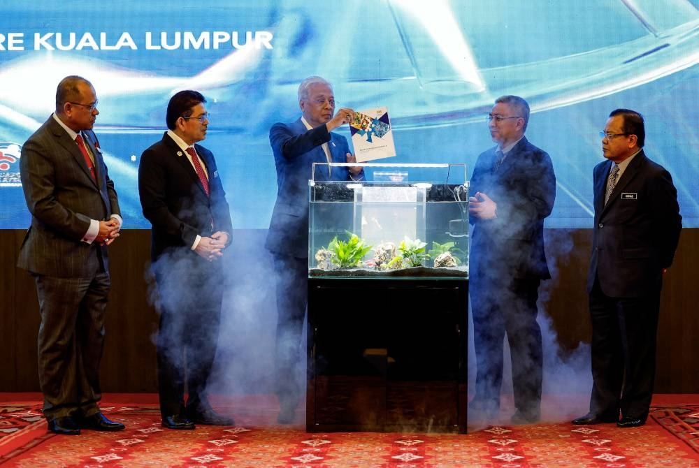 Perdana Menteri, Datuk Seri Ismail Sabri Yaakob melakukan gimik sempena Majlis Pelancaran Dasar Bioteknologi Negara 2.0 di Pusat Dagangan Dunia, pada Isnin. - Foto Bernama
