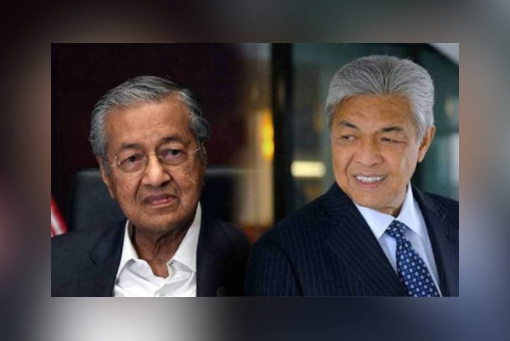 Tun Mahathir (kiri) dan Ahmad Zahid. 