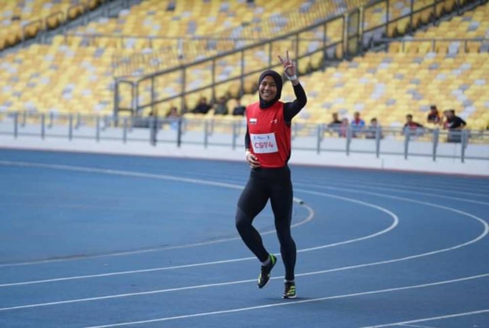 Nor Sarah menyumbang emas buat kontinjen Pahang setelah mengungguli acara 100m wanita di Bukit Jalil pada Jumaat. - Foto Agensi