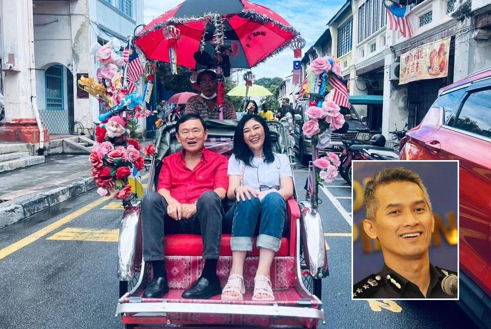 Thaksin dan Yingluck menaiki beca ketika melawat Pulau Pinang. Gambar kecil: Mohd Shuhaily