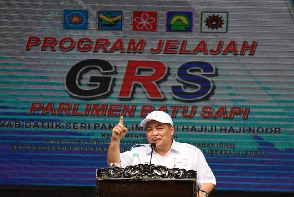 Hajiji ketika berucap pada program Jelajah GRS Batu Sapi di Kampung Lupak Meluas Darat, Sandakan.