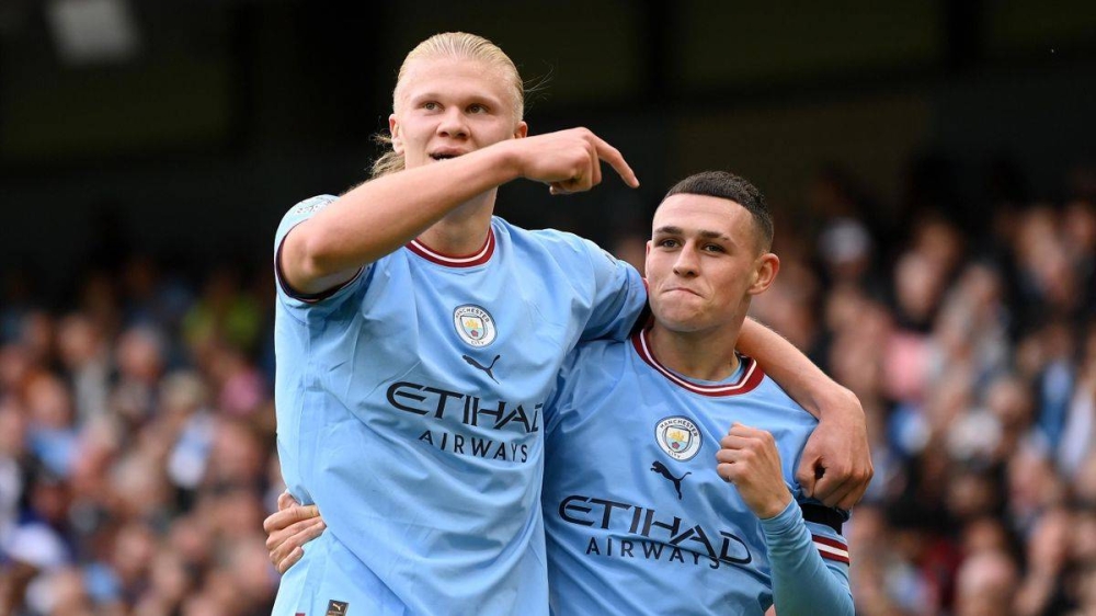 Haaland (kiri) dan Foden meledak hatrik ketika membantu City membenam United 6-3 dalam saingan EPL. Foto Agensi.