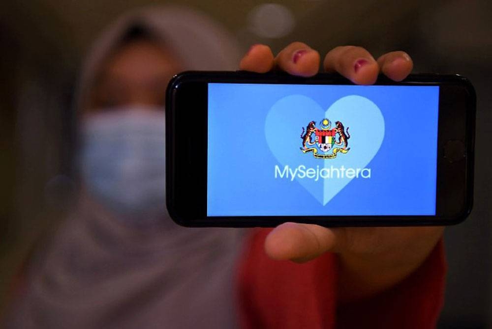 Aplikasi MySejahtera bakal diletakkan di bawah satu bahagian baharu Kementerian Kesihatan Malaysia (KKM) iaitu Kesihatan Awam Digital. - Foto hiasan