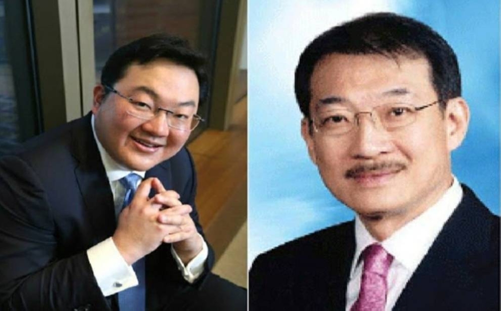 Jho Low (kiri) dan bapanya, Tan Sri Larry Low Hock Peng (kanan) - Foto Bernama