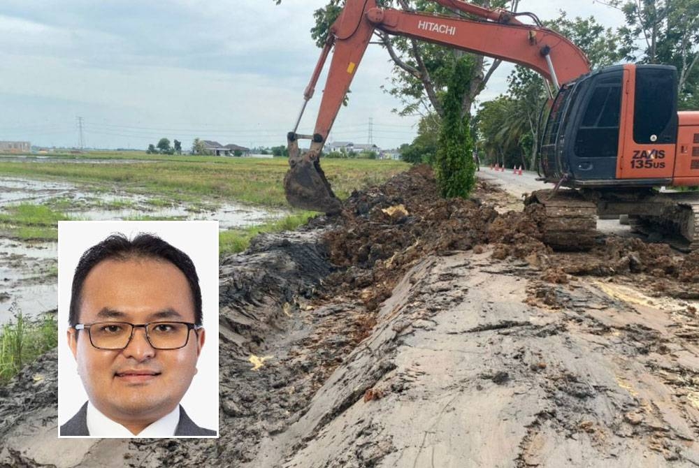 Kerja-kerja pemasangan paip dilakukan di sekitar LRA Pelubang. Gambar kecil: Mohd Iskandar Dzulkarnain Ramli