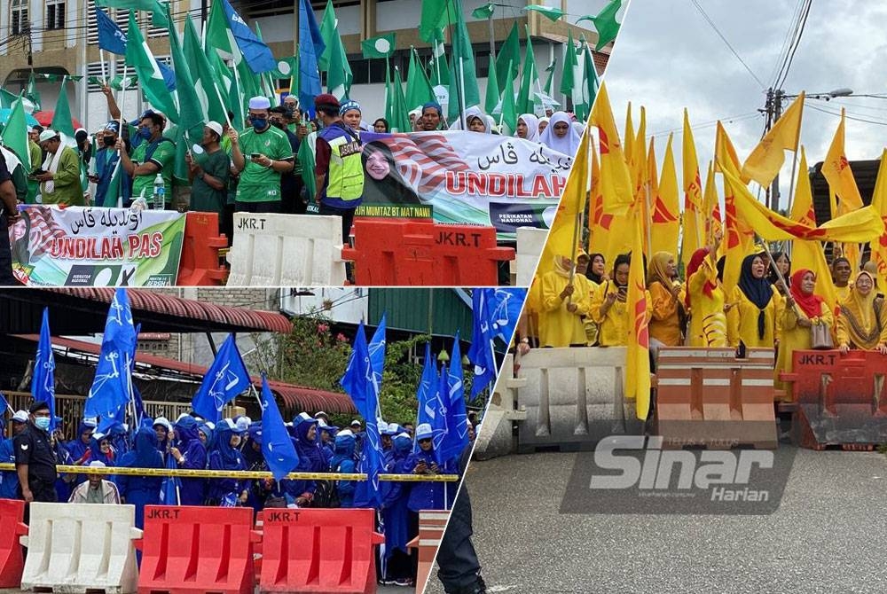 Aksi berbalas-balas sorakan menggegarkan suasana di pekarangan pusat penamaan calon Parlimen Tumpat di Pejabat Tanah dan Jajahan Tumpat pada Sabtu.