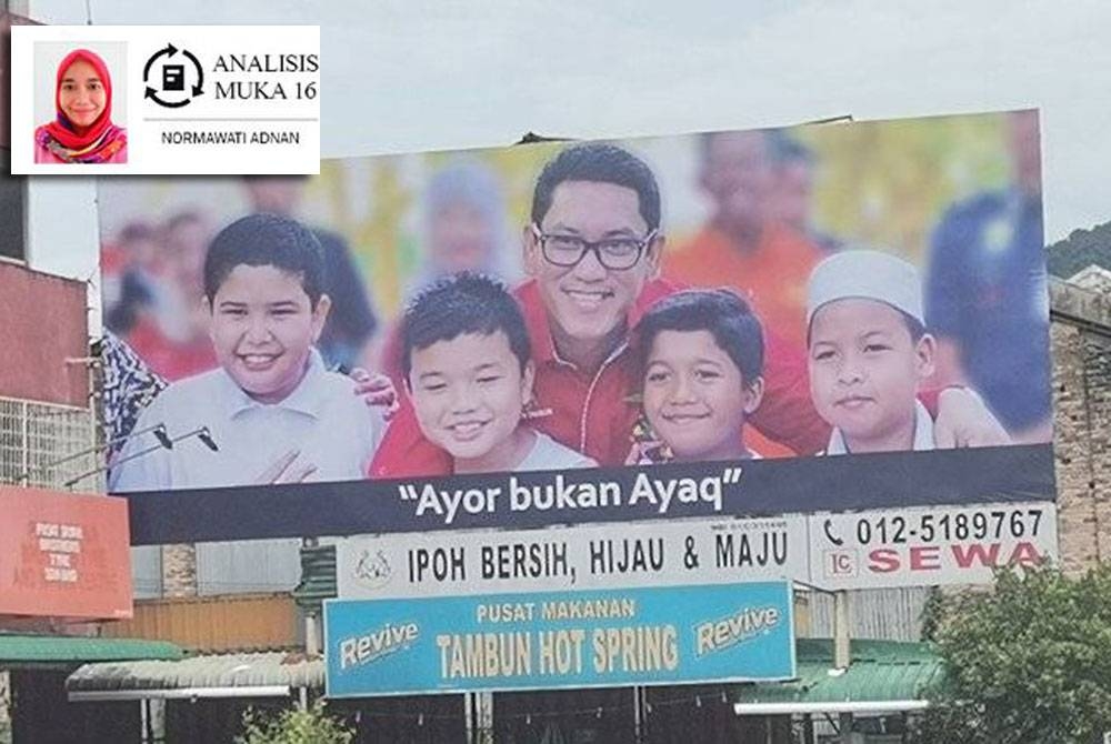 Papan iklan Ahmad Faizal dengan ayat ‘Ayor bukan Ayaq’ yang dipasang di laluan utama pekan Tambun, sebelum ditukar dengan yang baharu dengan mesej ‘‘Mohon Doa Restu’.