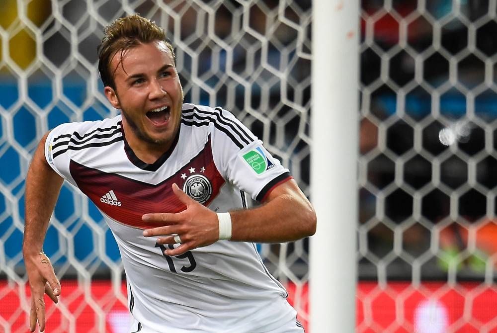 IMBAS KEMBALI...Goetze meraikan jaringannya ketika Jerman menewaskan Argentina, 1-0 dalam perlawanan akhir Piala Dunia Brazil 2014 di Stadium Maracana, Rio de Janeiro, Brazil. - Foto AFP