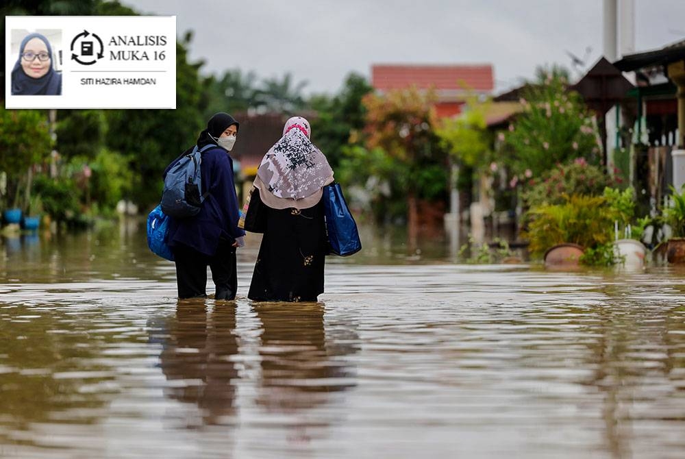 Keadaan banjir di sebuah taman perumahan di sekitar Klang. Foto Bernama.