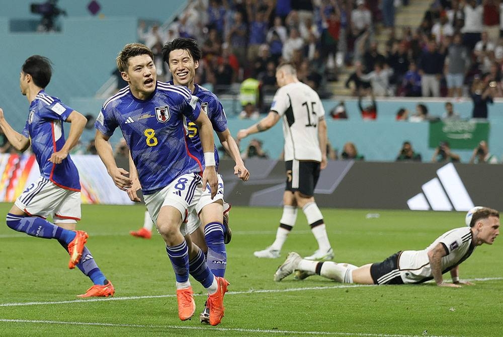 Doan menyumbat gol penyamaan Jepun ketika aksi menentang Jerman di Stadium Antarabangsa Khalifa sebentar tadi. Foto EPA