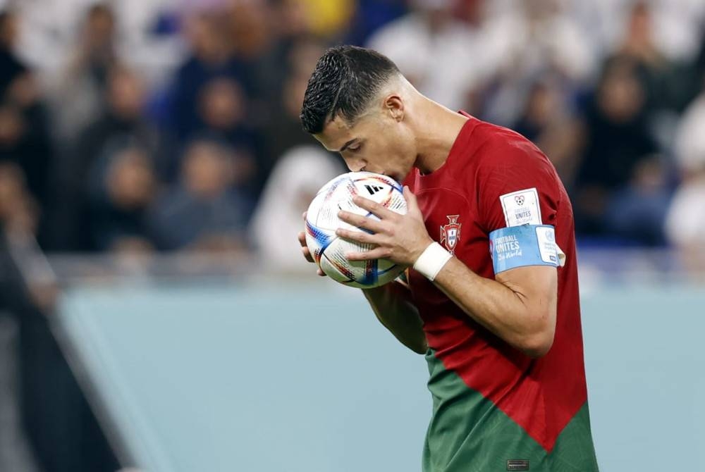 Ronaldo meledak satu gol ketika membantu Portugal menewaskan Ghana 3-2 pada aksi Piala Dunia Qatar 2022. - Foto EPA