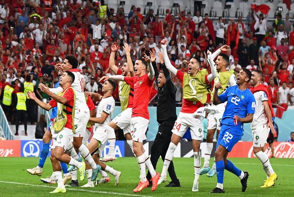 Pemain Maghribi meraikan kejayaan menewaskan Belgium 2-0 dalam aksi Kumpulan F Piala Dunia Qatar 2022 di Stadium Al Thumama pada Ahad. - Foto EPA