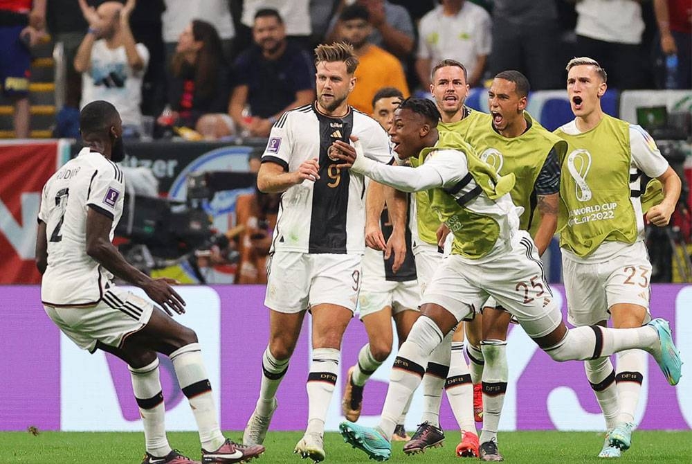 Fuellkrug (dua kiri) menjaringkan gol penyamaan buat Jerman ketika berdepan Sepanyol di Stadium Al Bayt. FOTO: EPA