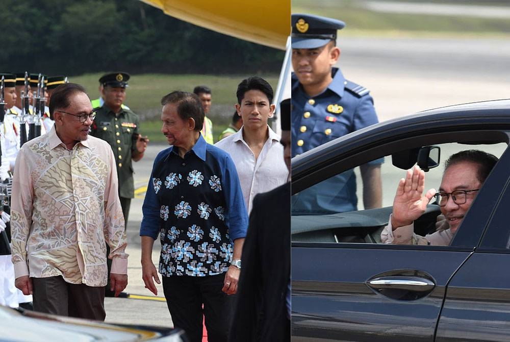 Anwar (kiri) menyambut keberangkatan tiba Sultan Hassanal Bolkiah serta delegasi Brunei yang selamat mendarat di Pangkalan TUDM pada 11.40 pagi. - Foto Jabatan Penerangan