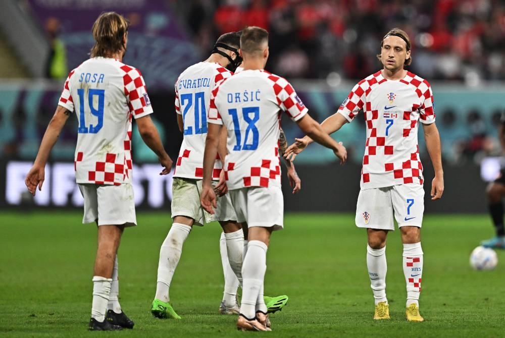 Pemain Croatia meraikan jaringan keempat Majer ketika berdepan Kanada dalam aksi Kumpulan F Piala Dunia Qatar 2022 di Stadium Antarabangsa Khalifa, Doha. - Foto EPA