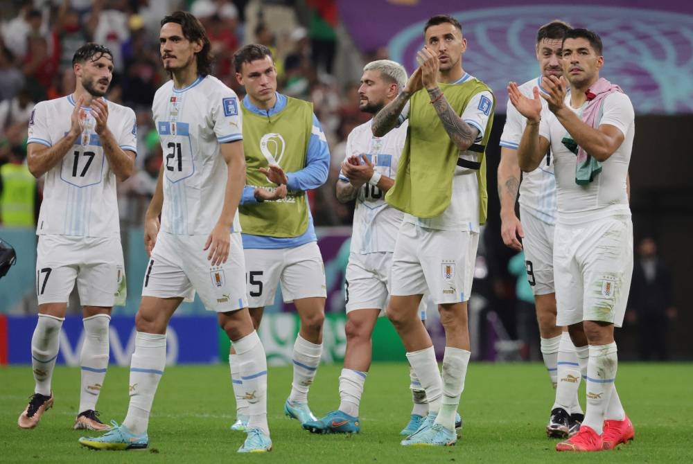 Reaksi pemain Uruguay selepas tewas 0-2 kepada Portugal dalam aksi Kumpulan H Piala Dunia Qatar 2022 di Stadium Lusail pada Rabu. - Foto EPA