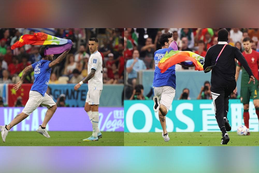 Lelaki yang menceroboh padang dengan membawa bendera berwarna pelangi ketika aksi Kumpulan H yang menemukan Portugal dan Uruguay di Stadium Lusail pada Selasa. - Foto EPA