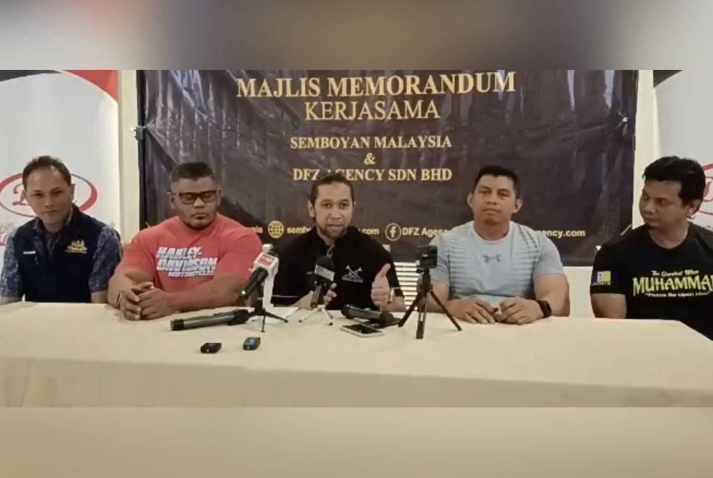 Yusuf Azmi (tengah) pada sidang media selepas Majlis Menandatangani Memorandum Kerjasama (MoC) bersama DFZ Agency Sdn Bhd pada Selasa.