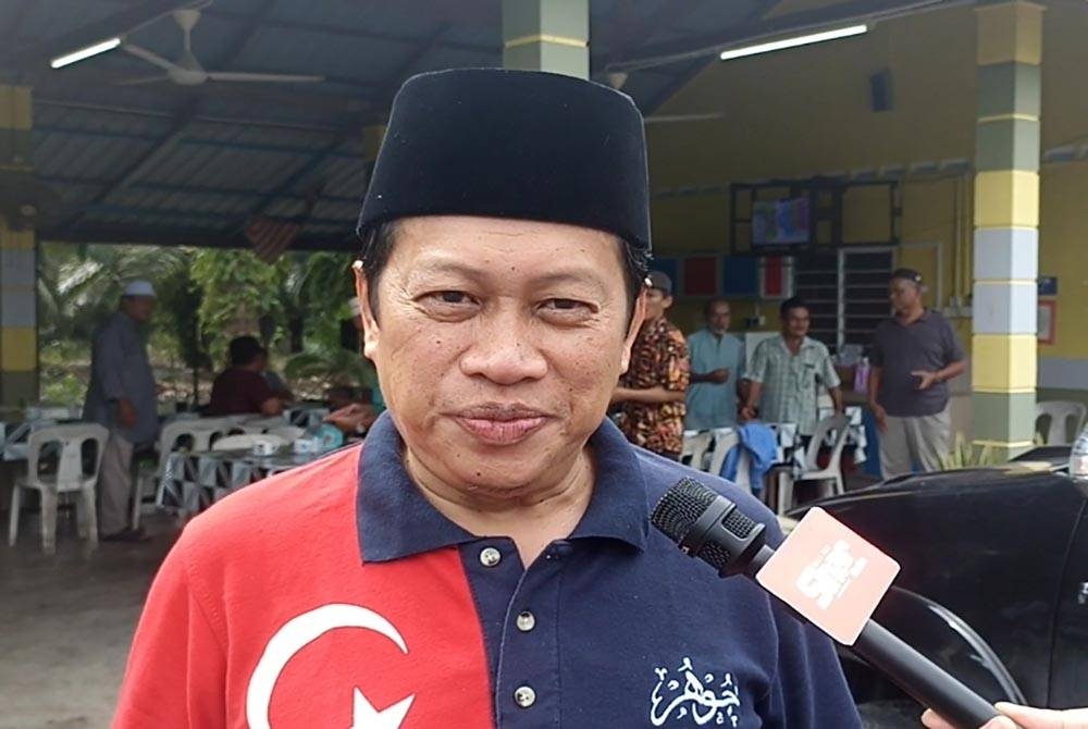 AHMAD MASLAN