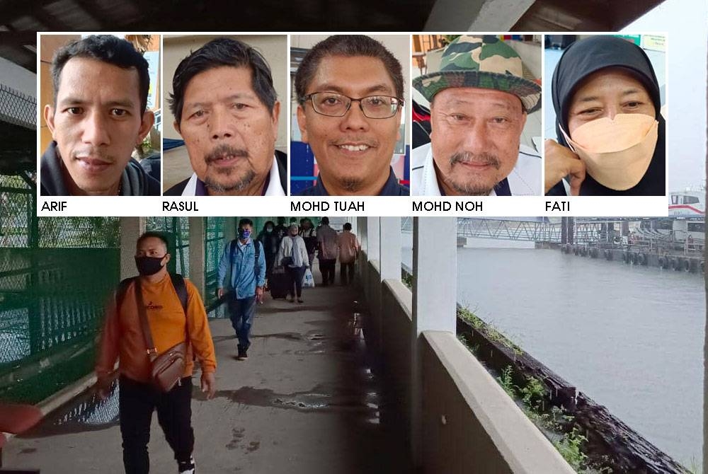 Penumpang dari Batam, Indonesia sejurus tiba di Terminal Feri Pasir Gudang, Pasir Gudang, pada Ahad.